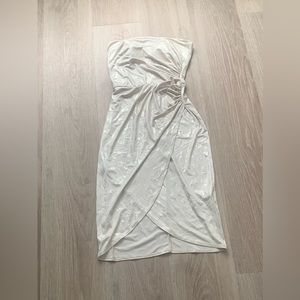 Brand new no tag Beige Bebe dress